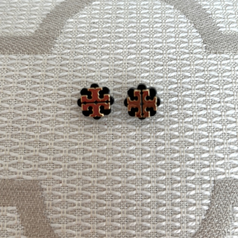 Tory Burch black and gold stud earrings.